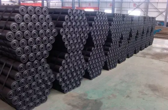 What are the various types of rollers used in conveyor belts?